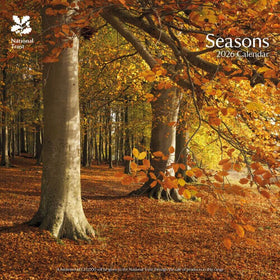 Autumnal forest scene with trees and fallen leaves, featuring the National Trust logo and 'Seasons 2026 Calendar' text.