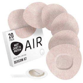 Pack of Dexcom G7 patches with packaging on a white background