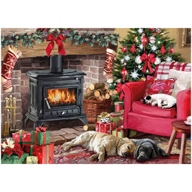 Cozy Christmas living room with a fireplace, tree, cat and sleeping dogs.