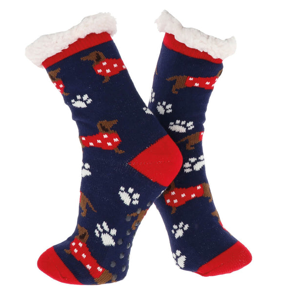 Blue and red socks with sausage dog design on a white background.