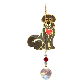 Dog-shaped keychain with a red heart and crystal on a white background