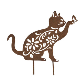 Rustic brown metal cat and butterfly decoration on a white background.