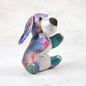 Colorful stuffed dog toy with rhinestone embellishments on a white background