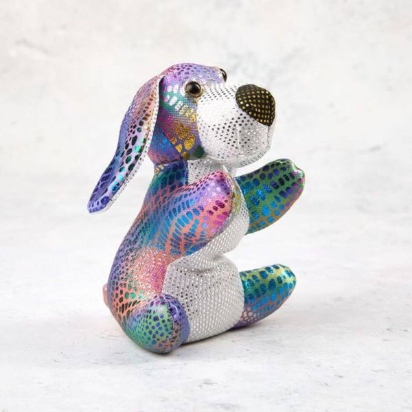 Colorful stuffed dog toy with rhinestone embellishments on a white background