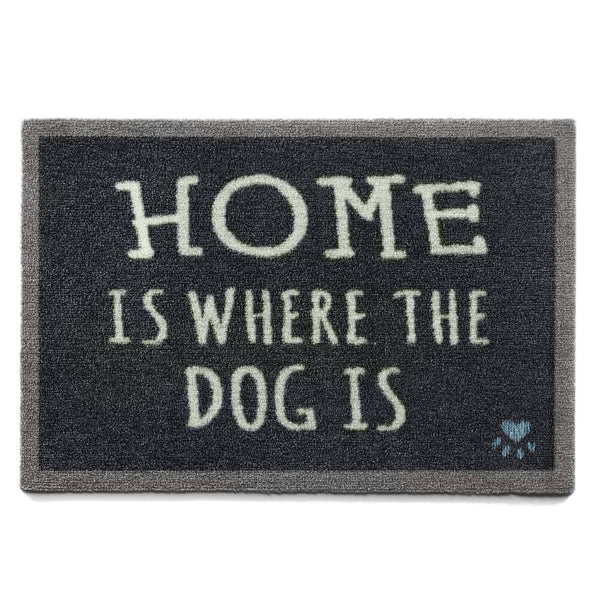 Doormat with 'Home is where the dog is' text on a white background