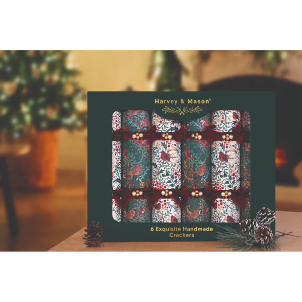 Silver and blue crackers in a Harvey and Mason box featuring a Christmas background.