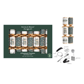 Harvey & Mason 8-piece Christmas crackers gift set shown with the dark green retail box, two unpackaged crackers standing upright, and a small accessory kit with labeled tools on a white background.