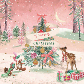 Christmas card with festive trees, deer, and presents in a snowy forest setting.