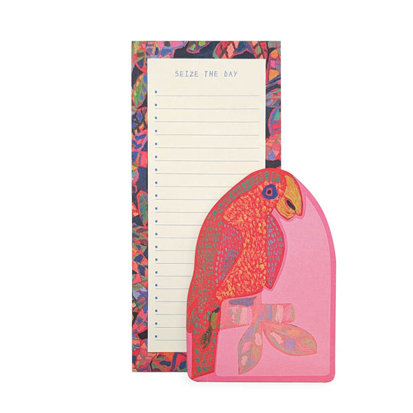 Notepad with colorful parrot design and 'Seize the Day' text on a white background