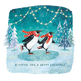 Two skating penguins with red scarfs Christmas card design for 2025
