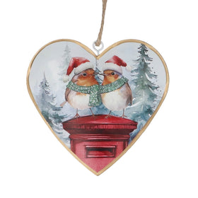 Heart-shaped tin Christmas tree decoration featuring two robins wearing Santa hats on a red post box.