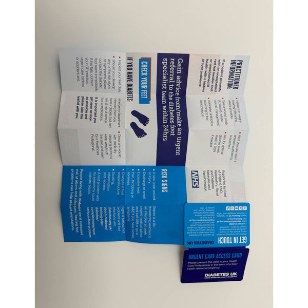 Folded leaflet with text and branding on a plain background