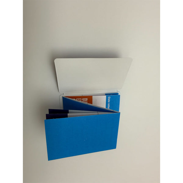 Blue cardholder with multiple cards on a light gray background