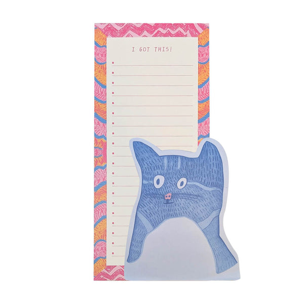 Notepad with a blue cat illustration and colorful border on a white background