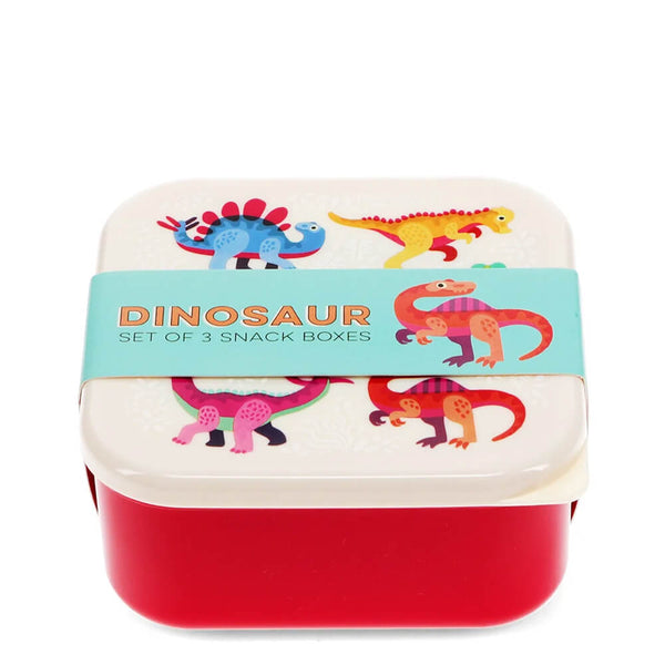Set of three dinosaur-themed snack boxes with colorful illustrations on a white background