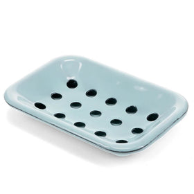 Light blue enamel soap dish with drainage holes on a white background