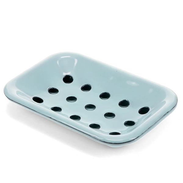Light blue enamel soap dish with drainage holes on a white background