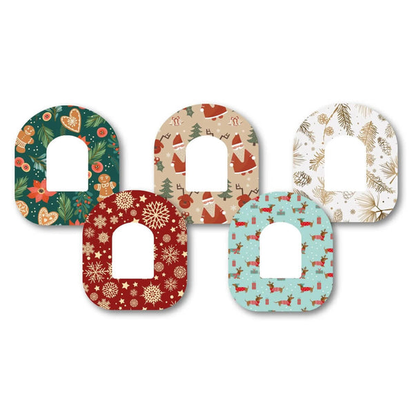 Christmas-themed Omnipod patches (5 pack) featuring festive designs including Father Christmas, golden snowflakes, and winter scenes. Designed to protect and secure your device. Available from the Diabetes UK Online Shop.