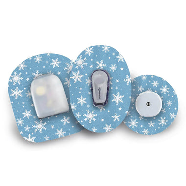 Let It Snow CGM patch with winter-themed design, offering secure and waterproof protection for your glucose monitor. Available from the Diabetes UK Online Shop.
