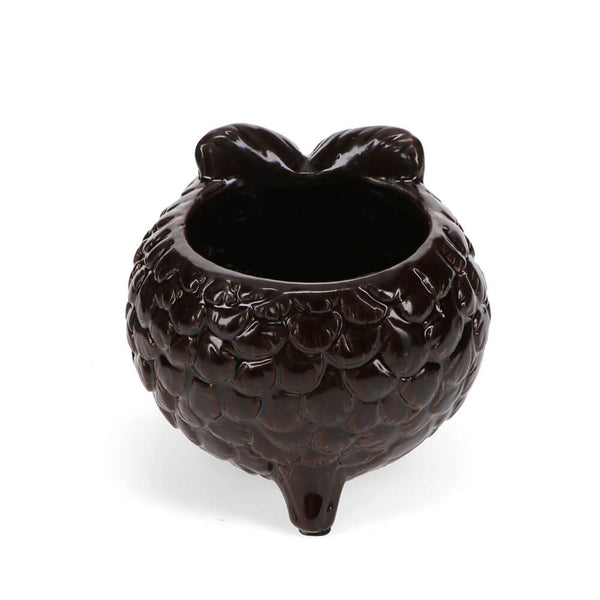 Brown owl planter from behind showing textured surface, on a white background