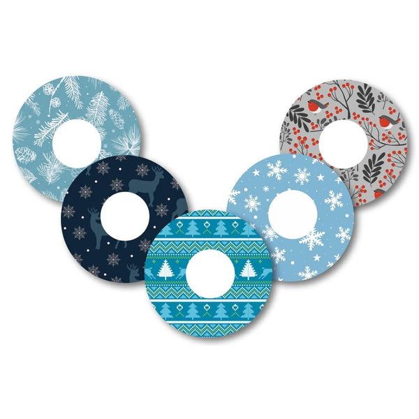 Winter-themed Libre 2 CGM patches (5 pack) designed to protect continuous glucose monitors with festive illustrations. Available from the Diabetes UK Online Shop.