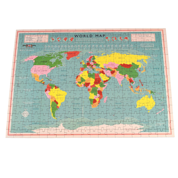World map puzzle in a tube