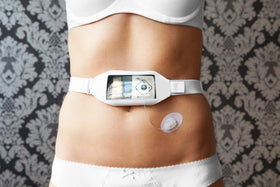 Person wearing white HID-In Multiway Body Band with clear window